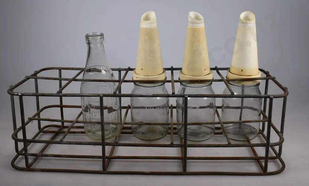 OIL BOTTLES AND STORAGE RACK Image 1++