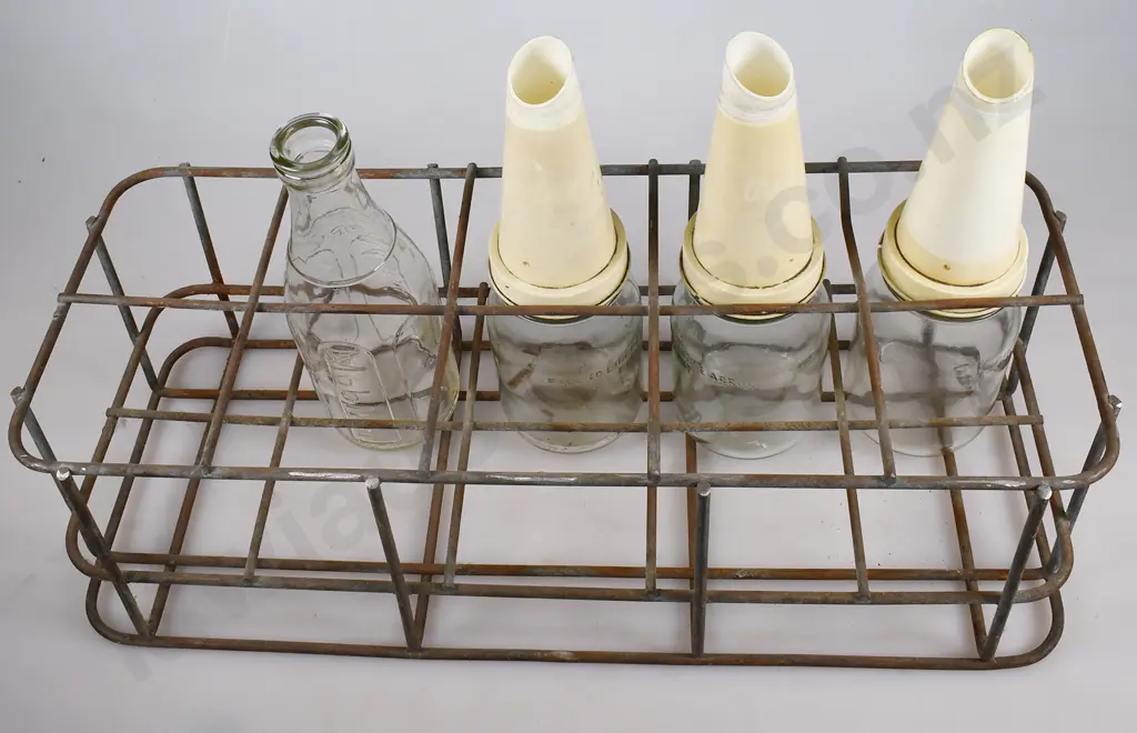 OIL BOTTLES AND STORAGE RACK Image 1++