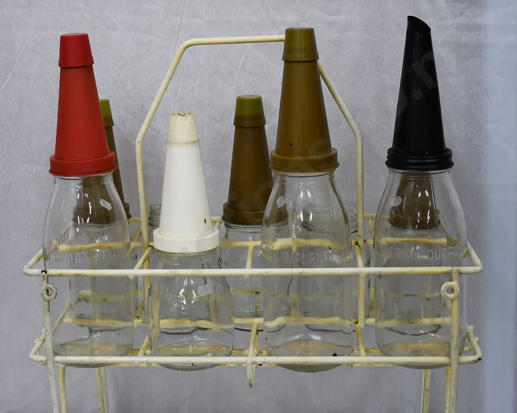 OIL BOTTLES AND STORAGE RACK Image 1++