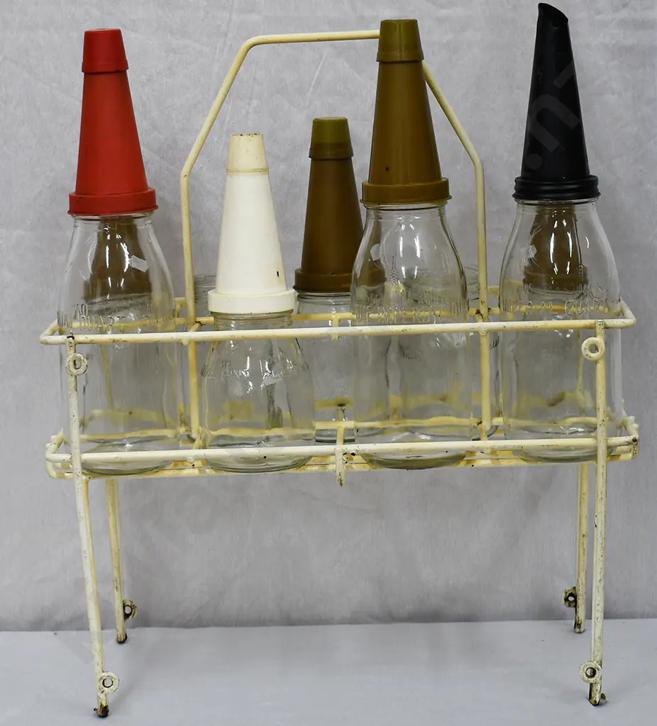OIL BOTTLES AND STORAGE RACK Image 1++