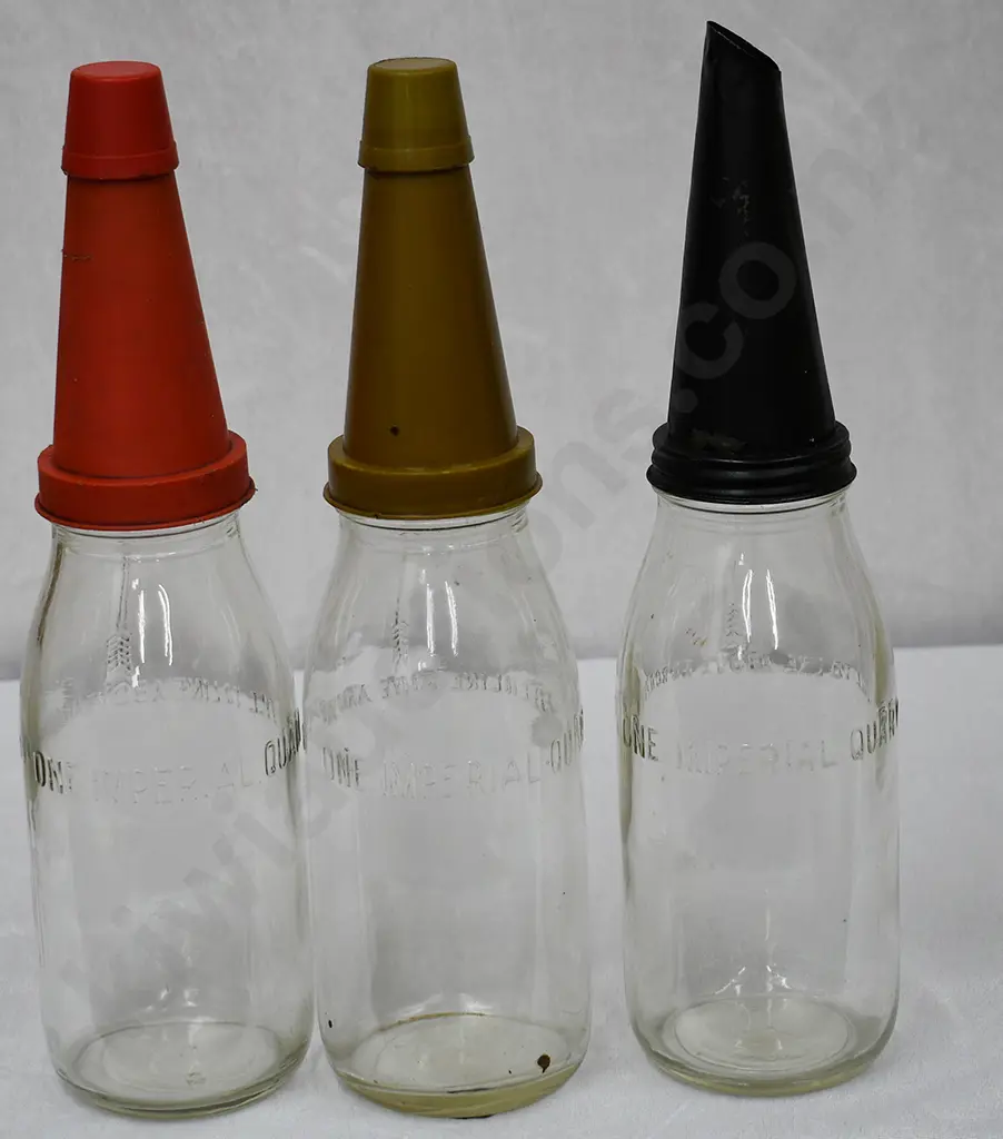 OIL BOTTLES AND STORAGE RACK Image 1++