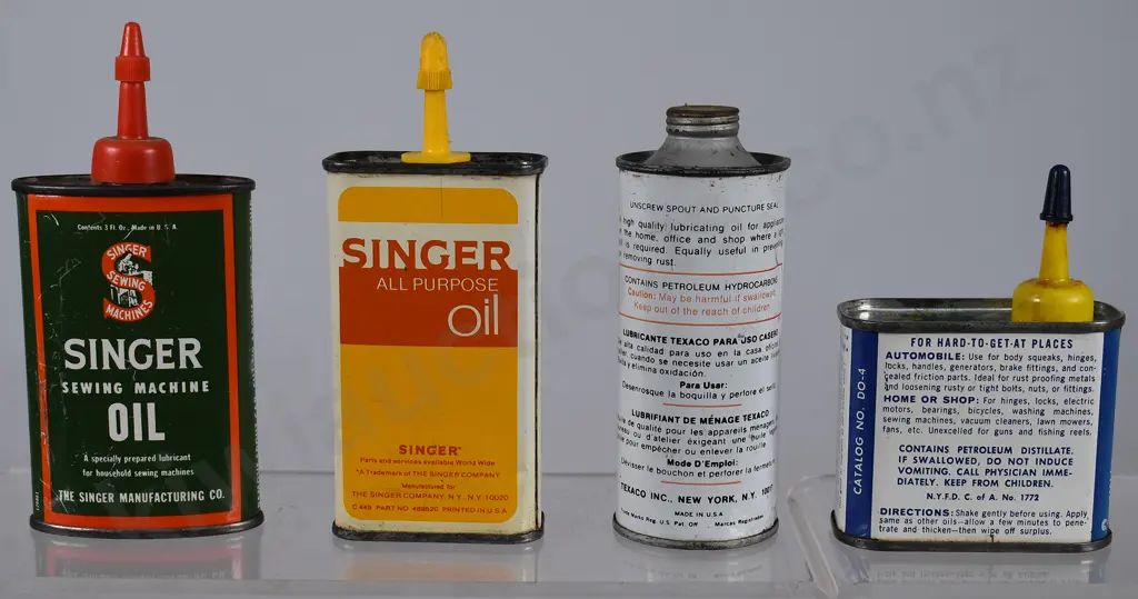 GROUP OF 4 SMALL OIL TINS Image 1++