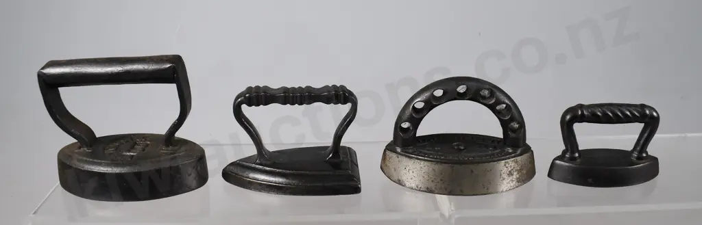 COLLECTION OF MINIATURE IRONS Image 1++