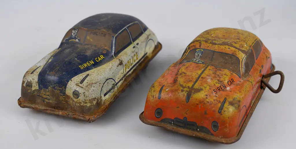 LINCOLN TOYS CLOCKWORK POLICE/FIRE CHIEF Image 1++